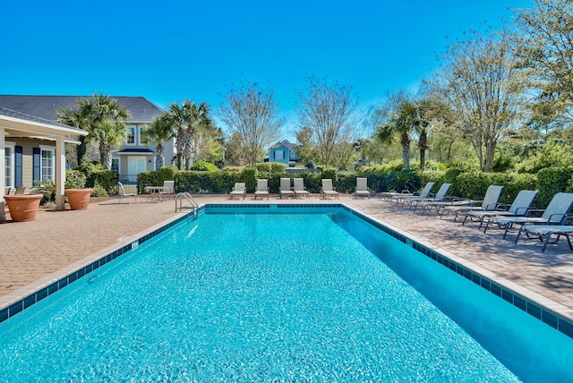 community pool with a patio