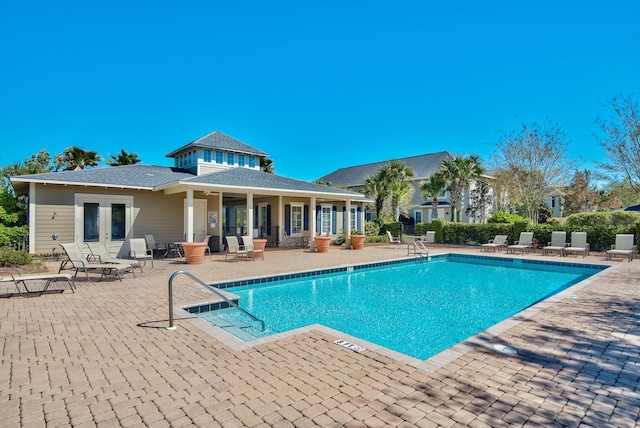 community pool featuring a patio area and french doors