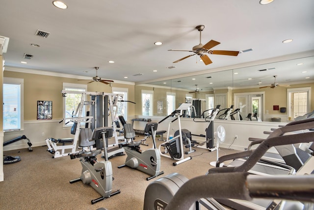exercise room featuring wainscoting, a ceiling fan, and recessed lighting