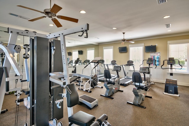 exercise room featuring crown molding, a ceiling fan, visible vents, and recessed lighting