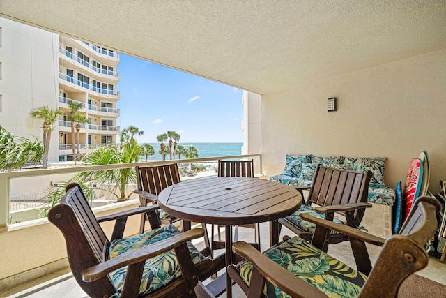 100 Gulf Shore Dr Unit 202, Destin, FL 32541 - balcony with a water view and outdoor dining space