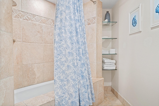 100 Gulf Shore Dr Unit 202, Destin, FL 32541 - bathroom with baseboards and tiled shower