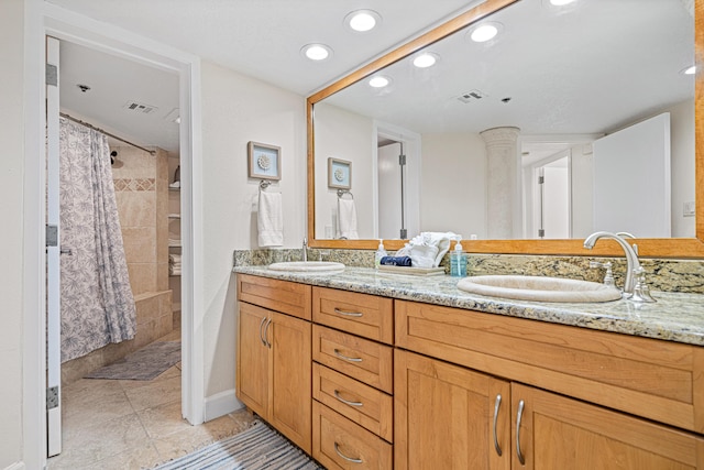 100 Gulf Shore Dr Unit 202, Destin, FL 32541 - bathroom featuring double vanity, visible vents, and a sink