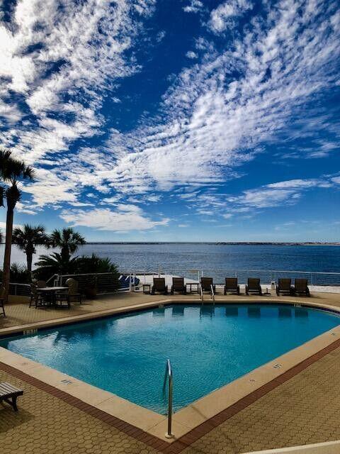 100 Gulf Shore Dr Unit 202, Destin, FL 32541 - pool featuring a water view
