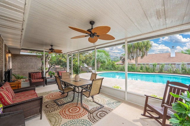 view of pool featuring a fenced backyard, a fenced in pool, an outdoor living space, a ceiling fan, and a patio