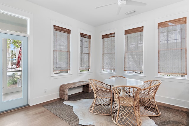 97 Sarasota St, Miramar Beach, FL 32550 - sunroom / solarium with baseboards, wood finished floors, and visible vents