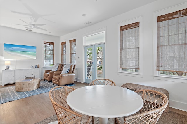 97 Sarasota St, Miramar Beach, FL 32550 - dining room featuring baseboards, ceiling fan, and wood finished floors