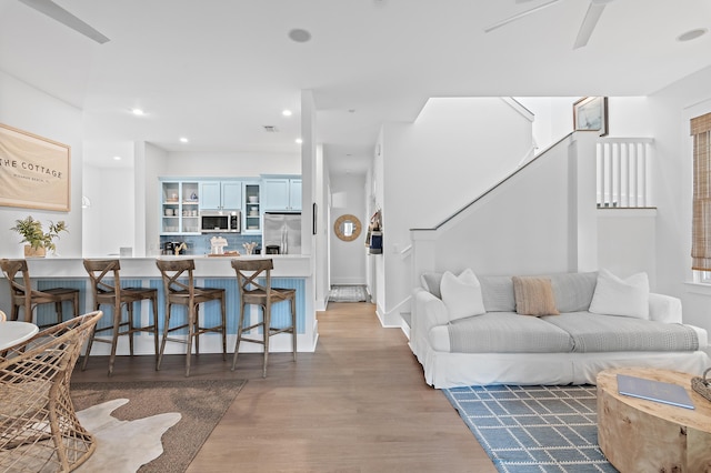 97 Sarasota St, Miramar Beach, FL 32550 - living area with recessed lighting, wood finished floors, and stairway