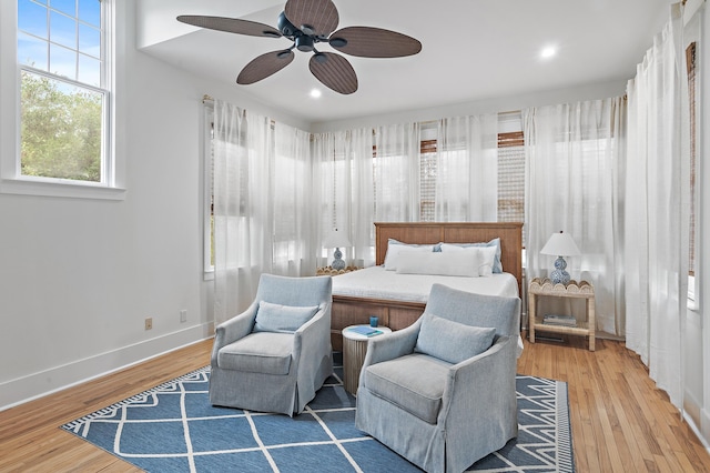 97 Sarasota St, Miramar Beach, FL 32550 - bedroom with baseboards, a ceiling fan, recessed lighting, and wood finished floors