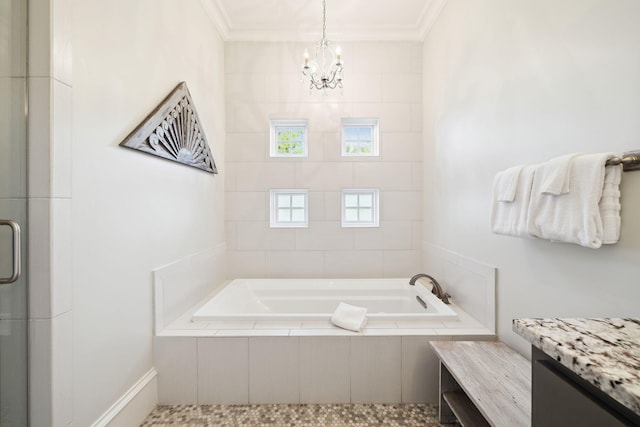 68 Creek Bridge Way, Watersound, FL 32461 - full bathroom with crown molding, a shower with door, tiled tub, and a notable chandelier