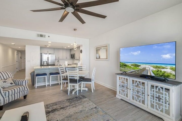 1751 Scenic Highway 98 Unit 906, Destin, FL 32541 - living area with baseboards, a ceiling fan, light wood-style flooring, and visible vents