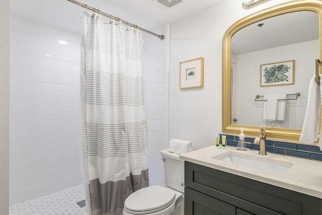 1751 Scenic Highway 98 Unit 906, Destin, FL 32541 - bathroom with toilet, tiled shower, and vanity