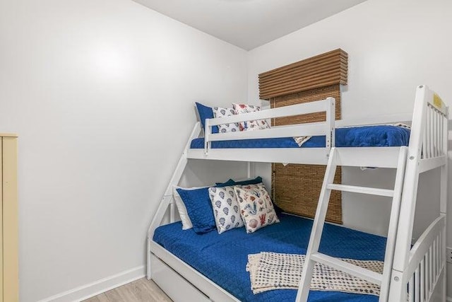 1751 Scenic Highway 98 Unit 906, Destin, FL 32541 - bedroom featuring baseboards and wood finished floors