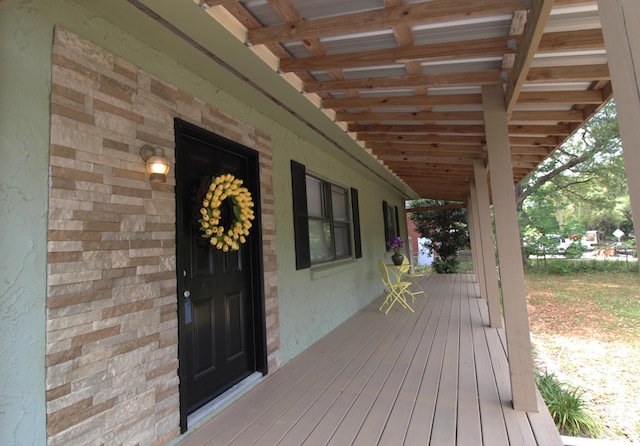 deck featuring covered porch