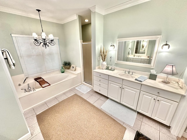 full bathroom featuring crown molding, a chandelier, a stall shower, a bath, and vanity
