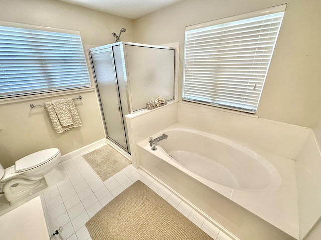 bathroom with a shower stall, a bath, toilet, and tile patterned floors