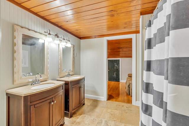 126 Tall Oaks Rd, Defuniak Springs, FL 32435 - full bath featuring a sink, wooden ceiling, a shower with shower curtain, and two vanities