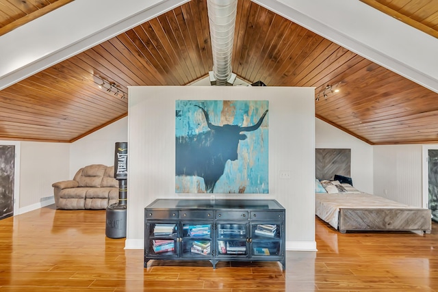 126 Tall Oaks Rd, Defuniak Springs, FL 32435 - bedroom featuring wood finished floors, baseboards, vaulted ceiling with beams, wooden ceiling, and rail lighting
