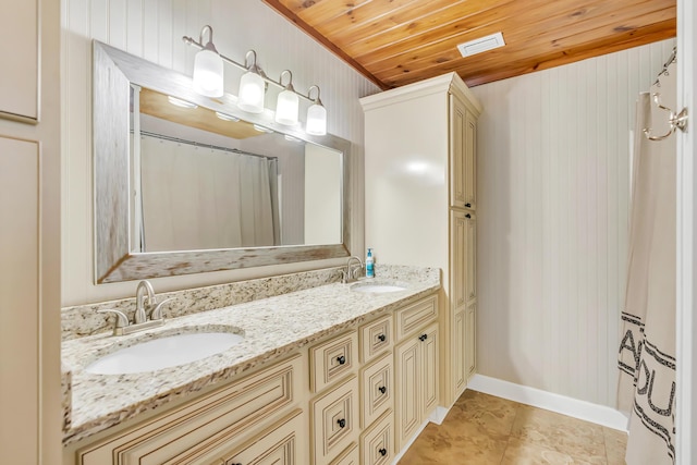 126 Tall Oaks Rd, Defuniak Springs, FL 32435 - full bath with visible vents, a sink, wood ceiling, and double vanity