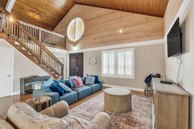 126 Tall Oaks Rd, Defuniak Springs, FL 32435 - living area with baseboards, wood ceiling, stairs, and high vaulted ceiling