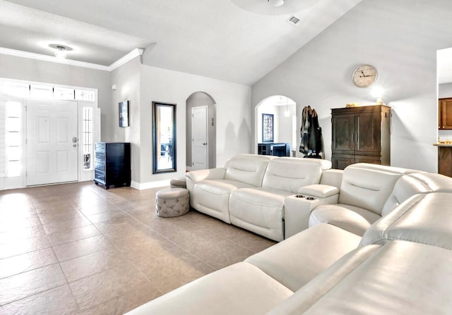 214 Whispering Lake Dr, Santa Rosa Beach, FL 32459 - living area with lofted ceiling, baseboards, visible vents, tile patterned flooring, and arched walkways