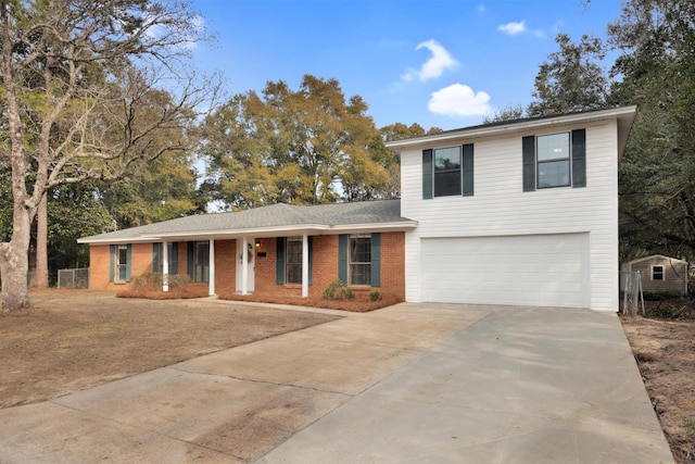 view of front facade featuring covered porch, brick siding, an attached garage, and driveway