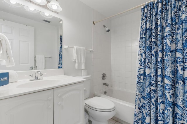 bathroom featuring toilet, shower / bathtub combination with curtain, and vanity