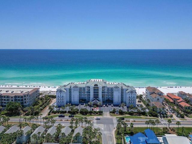 drone / aerial view of waterfront with a beach
