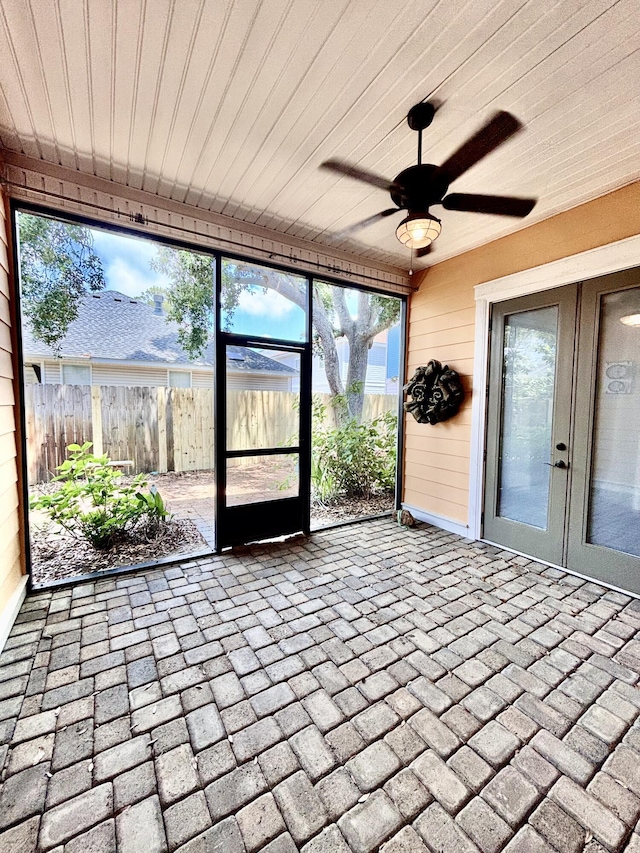 134 Rivercrest Cir, Santa Rosa Beach, FL 32459 - unfurnished sunroom with ceiling fan and french doors