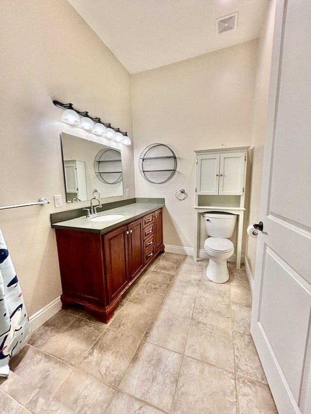 134 Rivercrest Cir, Santa Rosa Beach, FL 32459 - bathroom featuring toilet, vanity, and baseboards