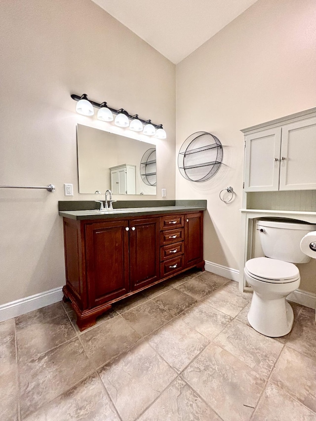 134 Rivercrest Cir, Santa Rosa Beach, FL 32459 - bathroom featuring baseboards, vanity, and toilet