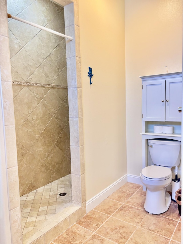 134 Rivercrest Cir, Santa Rosa Beach, FL 32459 - bathroom with tiled shower, toilet, baseboards, and tile patterned floors