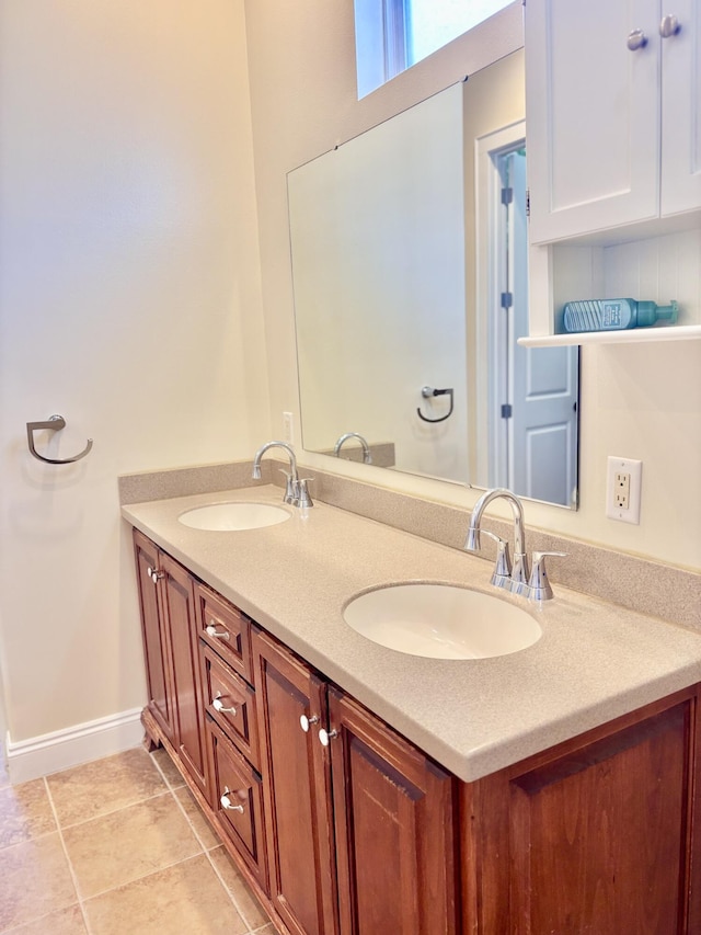 134 Rivercrest Cir, Santa Rosa Beach, FL 32459 - bathroom featuring baseboards, double vanity, and tile patterned floors