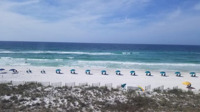 view of water feature with a beach view