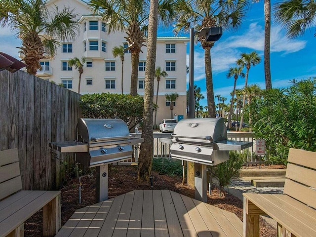 view of patio with fence and area for grilling