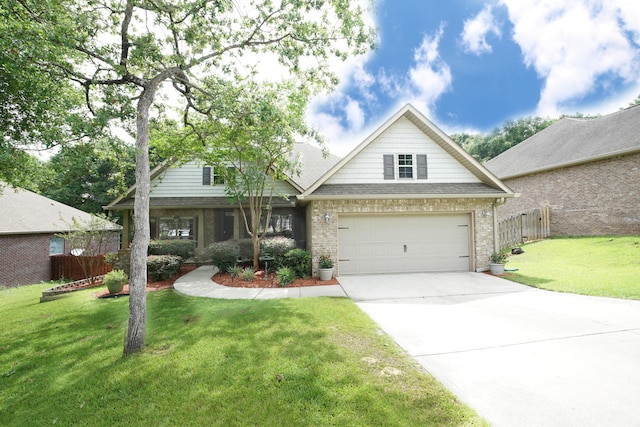 614 Red Fern Rd, Crestview, FL 32536 - view of front of home with driveway, a garage, brick siding, and roof with shingles