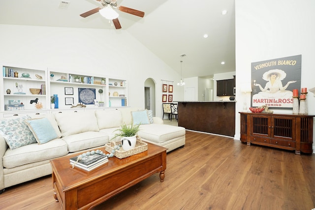614 Red Fern Rd, Crestview, FL 32536 - living area featuring a ceiling fan, high vaulted ceiling, arched walkways, light wood-type flooring, and recessed lighting