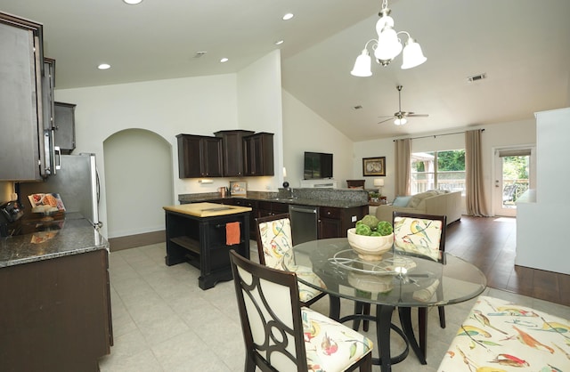 614 Red Fern Rd, Crestview, FL 32536 - dining area with arched walkways, a ceiling fan, high vaulted ceiling, baseboards, and recessed lighting