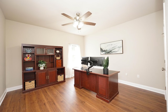 614 Red Fern Rd, Crestview, FL 32536 - office featuring dark wood-type flooring, a ceiling fan, and baseboards