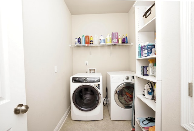 614 Red Fern Rd, Crestview, FL 32536 - washroom featuring washing machine and dryer, baseboards, and light tile patterned flooring