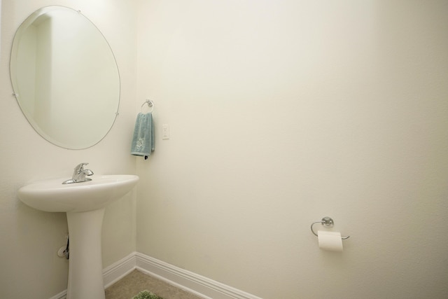 614 Red Fern Rd, Crestview, FL 32536 - bathroom featuring baseboards and a sink