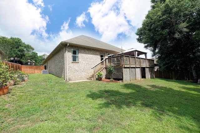 614 Red Fern Rd, Crestview, FL 32536 - back of property with stairs, a wooden deck, cooling unit, and brick siding