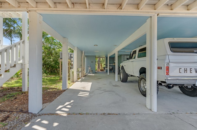 300 Cain Rd Unit 320, Panama City Beach, FL 32413 - view of parking / parking lot featuring stairway