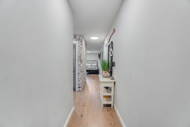 300 Cain Rd Unit 320, Panama City Beach, FL 32413 - corridor featuring baseboards and light wood finished floors