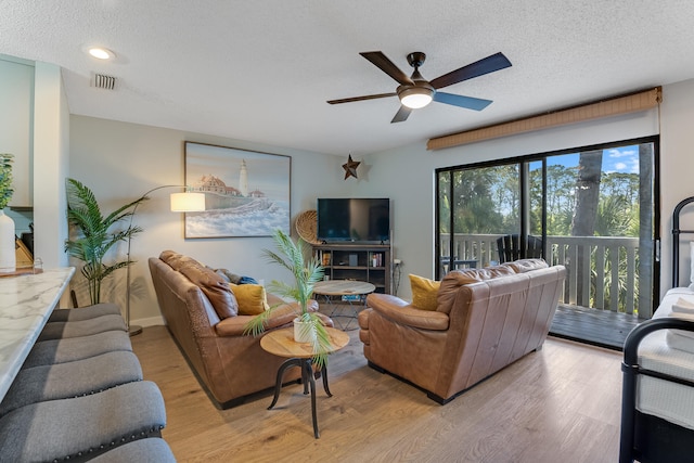300 Cain Rd Unit 320, Panama City Beach, FL 32413 - living area with visible vents, light wood-style floors, recessed lighting, a textured ceiling, and a ceiling fan