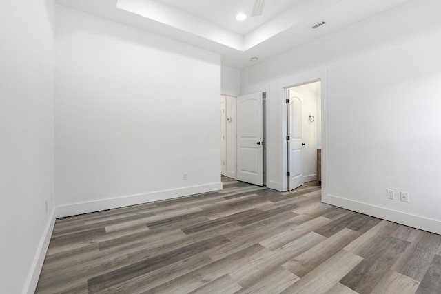 1429 N County Highway 393, Santa Rosa Beach, FL 32459 - spare room featuring baseboards, visible vents, and wood finished floors