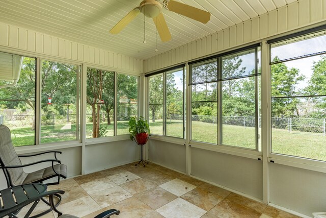 6100 Buck Ward Rd, Baker, FL 32531 - unfurnished sunroom with ceiling fan