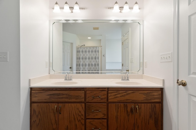 6100 Buck Ward Rd, Baker, FL 32531 - bathroom featuring a sink, double vanity, and a shower with shower curtain