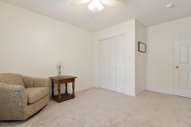 6100 Buck Ward Rd, Baker, FL 32531 - living area featuring carpet floors, baseboards, and ceiling fan