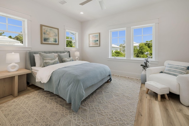 bedroom with light wood-style flooring, recessed lighting, baseboards, visible vents, and ceiling fan